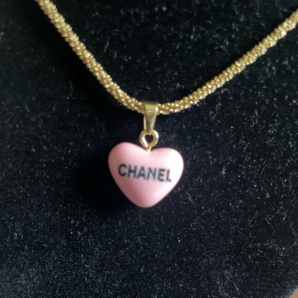 CHANEL Gold Necklace with Pink Heart Chanel jewelry pouch, and Chanel box.